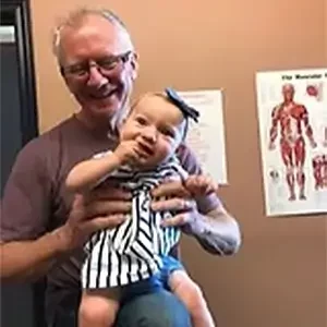 Dr. Zavits with the Child